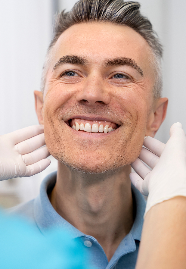 https://www.boroniaheightsfamilydental.com.au/wp-content/uploads/2025/06/close-up-doctor-checking-man-1.jpg